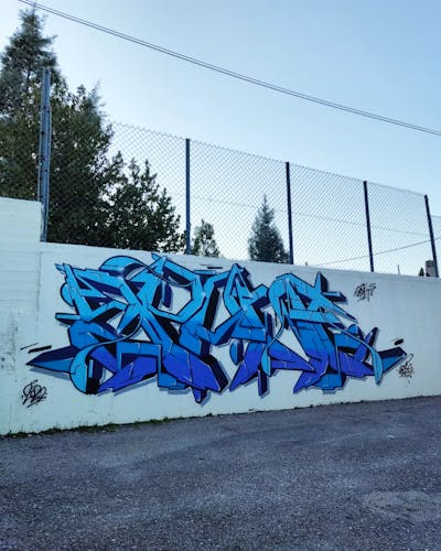 Light Blue and Blue Stylewriting by Spant. This Graffiti is located in Levadia, Greece and was created in 2022.