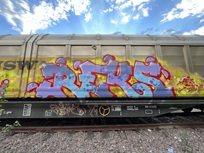 Colorful Stylewriting by REKS. This Graffiti is located in Italy and was created in 2023. This Graffiti can be described as Stylewriting, Trains and Freights.