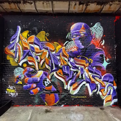 Orange and Violet Stylewriting by REVES ONE. This Graffiti is located in Brussels, Belgium and was created in 2022. This Graffiti can be described as Stylewriting, Characters and Abandoned.