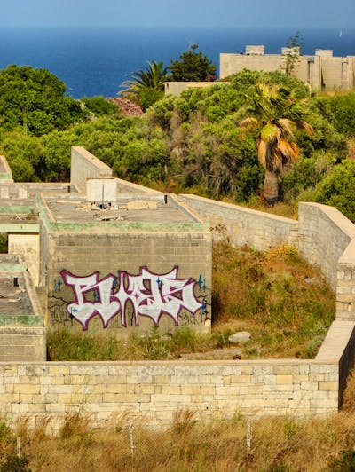 White and Red Stylewriting by Riots. This Graffiti is located in Malta and was created in 2011. This Graffiti can be described as Stylewriting and Abandoned.