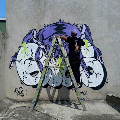 White and Violet Stylewriting by Giusseppe. This Graffiti is located in CDMX, Mexico and was created in 2024. This Graffiti can be described as Stylewriting, Characters and Atmosphere.