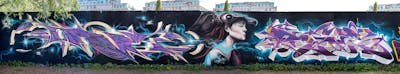Violet and Colorful Stylewriting by Wave Nine, Mon, Cors One and dejoe. This Graffiti is located in Berlin, Germany and was created in 2022. This Graffiti can be described as Stylewriting, Characters and Wall of Fame.