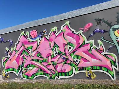 Coralle and Colorful Stylewriting by Zefir. This Graffiti is located in Poland and was created in 2022. This Graffiti can be described as Stylewriting, Characters and Wall of Fame.