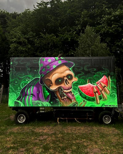 Light Green and Colorful Characters by Tokk. This Graffiti is located in Germany and was created in 2022. This Graffiti can be described as Characters and Cars.