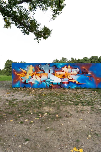 Colorful and Orange and Light Blue Stylewriting by Rowdy. This Graffiti is located in Leipzig, Germany and was created in 2023.