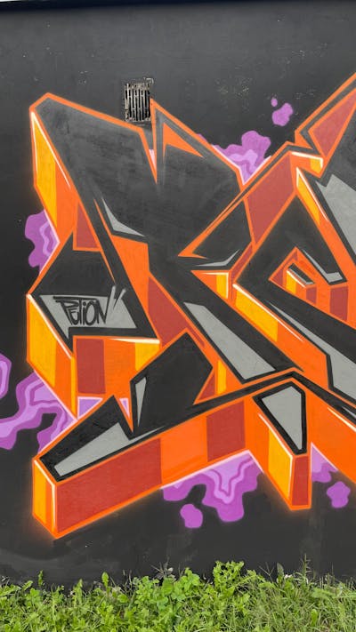 Black and Orange Stylewriting by PETION. This Graffiti is located in Kluczbork, Poland and was created in 2022.