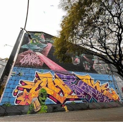 Colorful Stylewriting by Check91_. This Graffiti is located in Comuna 13, Colombia and was created in 2022. This Graffiti can be described as Stylewriting, Characters and Murals.