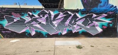 Grey and Coralle and Cyan Stylewriting by Jeks. This Graffiti is located in United States and was created in 2023.