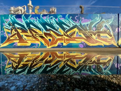 Cyan and Yellow and Colorful Stylewriting by Fresco. This Graffiti is located in Essex, United Kingdom and was created in 2023.
