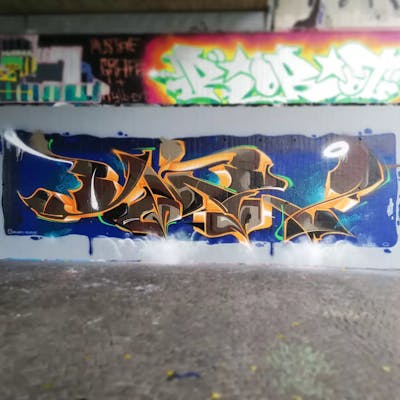 Brown and Orange Stylewriting by Roweo and mtl crew. This Graffiti is located in Saalfeld (Saale), Germany and was created in 2022. This Graffiti can be described as Stylewriting and Wall of Fame.