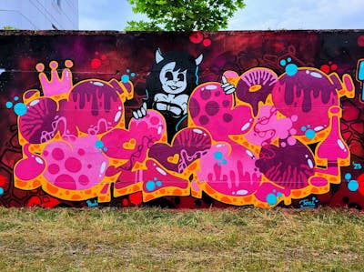 Coralle and Colorful and Red Stylewriting by Toosy. This Graffiti is located in Magdeburg, Germany and was created in 2023. This Graffiti can be described as Stylewriting, Characters and Wall of Fame.