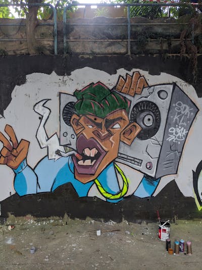 Colorful Characters by Sol. This Graffiti is located in Kuala Lumpur, Malaysia and was created in 2023.