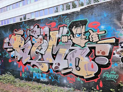 Colorful and Grey Stylewriting by Remo. This Graffiti is located in Magdeburg, Germany and was created in 2024. This Graffiti can be described as Stylewriting and Characters.