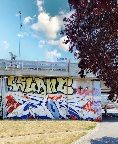 White and Blue and Red Stylewriting by Riots and SUANG. This Graffiti is located in Prague, Czech Republic and was created in 2023.