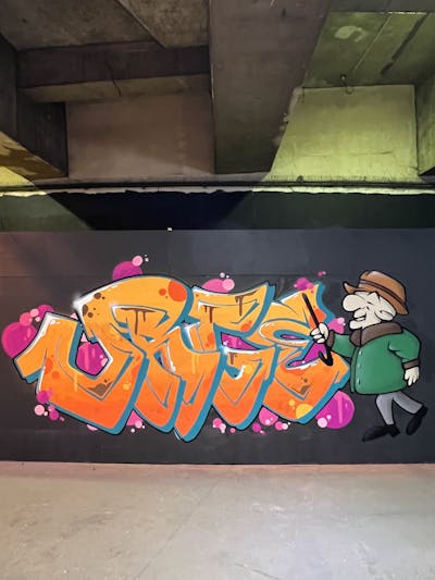 Orange and Colorful Stylewriting by Urge. This Graffiti is located in United Kingdom and was created in 2025. This Graffiti can be described as Stylewriting and Characters.