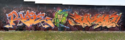 Orange Stylewriting by FOKUS.81 and Riser. This Graffiti is located in Fürth, Germany and was created in 2021. This Graffiti can be described as Stylewriting and Characters.