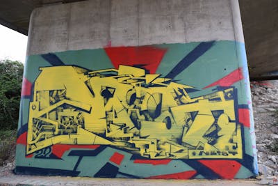 Yellow and Colorful Abandoned by Neist. This Graffiti is located in ST HIPPOLYTE DU FORT, France and was created in 2022. This Graffiti can be described as Abandoned, Stylewriting and Futuristic.