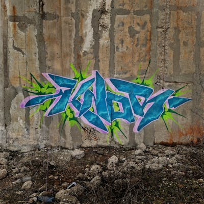 Cyan and Coralle and Light Green Stylewriting by Knor one. This Graffiti is located in Baia Mare, Romania and was created in 2024. This Graffiti can be described as Stylewriting and Abandoned.