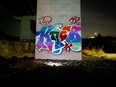 Colorful and White Stylewriting by KNEB. This Graffiti is located in Cyprus and was created in 2021. This Graffiti can be described as Stylewriting, Street Bombing, Abandoned and Atmosphere.