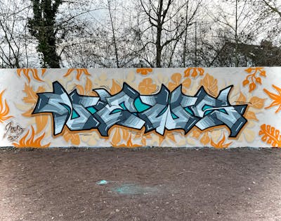 Grey and Orange Stylewriting by News. This Graffiti is located in Regensburg, Germany and was created in 2022. This Graffiti can be described as Stylewriting and Wall of Fame.