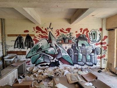 Cyan and Brown Stylewriting by Saro. This Graffiti is located in Magdeburg, Germany and was created in 2022. This Graffiti can be described as Stylewriting and Abandoned.