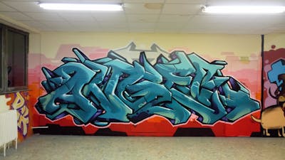 Cyan and Red Stylewriting by DCK, Angel and ALL CAPS COLLECTIVE. This Graffiti is located in Hungary and was created in 2019.