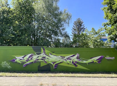 Light Green and Violet Stylewriting by Syck. This Graffiti is located in Bielefeld, Germany and was created in 2022. This Graffiti can be described as Stylewriting and Wall of Fame.