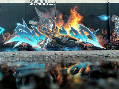 Orange and Light Blue Stylewriting by ArtkorBagdad. This Graffiti is located in Redon, France and was created in 2024. This Graffiti can be described as Stylewriting and Characters.