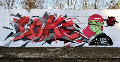 Red and Grey Stylewriting by Coke and Suzie. This Graffiti is located in Budapest, Hungary and was created in 2017. This Graffiti can be described as Stylewriting and Characters.