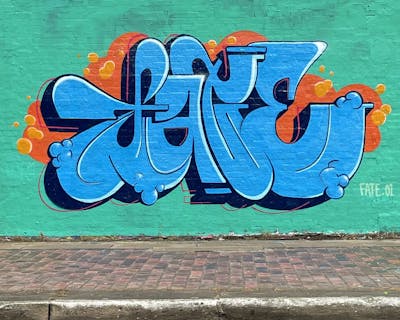 Cyan and Light Blue Stylewriting by Fate.01. This Graffiti is located in London, United Kingdom and was created in 2021. This Graffiti can be described as Stylewriting and Wall of Fame.