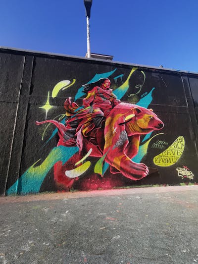 Coralle and Colorful Characters by REVES ONE. This Graffiti is located in United Kingdom and was created in 2024. This Graffiti can be described as Characters and Streetart.