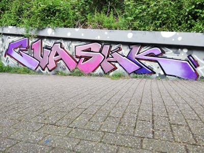 Violet and Coralle and Grey Stylewriting by Chr15, shik, CVA and SHK. This Graffiti is located in Essen, Germany and was created in 2023. This Graffiti can be described as Stylewriting.