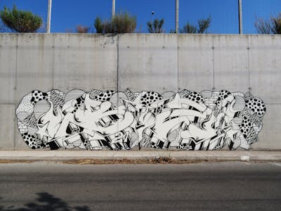 White and Black Stylewriting by BIZ. This Graffiti is located in Greece and was created in 2021. This Graffiti can be described as Stylewriting and Street Bombing.