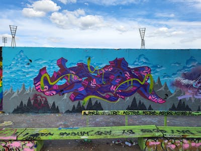 Light Blue and Violet Stylewriting by Dipa. This Graffiti is located in Berlin, Germany and was created in 2022. This Graffiti can be described as Stylewriting and Wall of Fame.