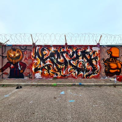 Red and Black and Orange Stylewriting by Keza. This Graffiti is located in LE HAVRE, France and was created in 2022. This Graffiti can be described as Stylewriting and Characters.