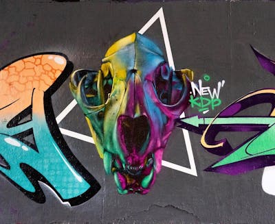 Colorful Characters by AIDN and New Cru. This Graffiti is located in Berlin, Germany and was created in 2022. This Graffiti can be described as Characters.