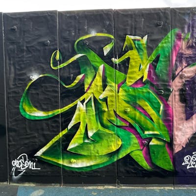 Light Green and Green and Violet Stylewriting by Czosen1. This Graffiti is located in Warsaw, Poland and was created in 2023.