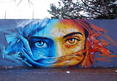 Light Blue and Yellow and Orange Stylewriting by Whyre87, Posk crew and KAC crew. This Graffiti is located in Geneva, Switzerland and was created in 2021. This Graffiti can be described as Stylewriting, Characters and Wall of Fame.