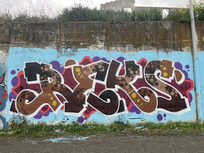 Brown and Colorful Stylewriting by REKS. This Graffiti is located in Ascoli Piceno, Italy and was created in 2023.