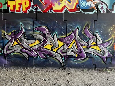 Grey and Violet and Yellow Stylewriting by News. This Graffiti is located in Boxtel, Netherlands and was created in 2023.