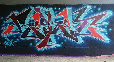 Light Blue and Red Stylewriting by Reset. This Graffiti is located in Hannover, Germany and was created in 2022. This Graffiti can be described as Stylewriting and Wall of Fame.