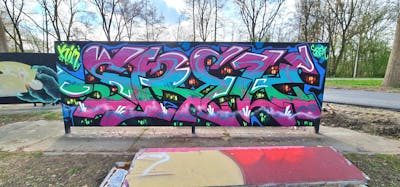 Colorful Stylewriting by Srek. This Graffiti is located in Delft, Netherlands and was created in 2022. This Graffiti can be described as Stylewriting and Wall of Fame.