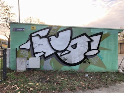 Chrome and Light Green Stylewriting by FYO Crew. This Graffiti is located in Poland and was created in 2022.