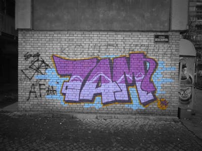 Violet and Grey Stylewriting by 7AM. This Graffiti is located in Novi Sad, CS and was created in 2012. This Graffiti can be described as Stylewriting and Street Bombing.