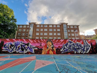 Red and Colorful and Violet Stylewriting by smo__crew, Core246, hertse1 and Chips. This Graffiti is located in London, United Kingdom and was created in 2020. This Graffiti can be described as Stylewriting, Characters, Wall of Fame and Murals.
