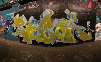 Light Green and Light Blue Stylewriting by PESOK. This Graffiti is located in London, United Kingdom and was created in 2022. This Graffiti can be described as Stylewriting and Wall of Fame.