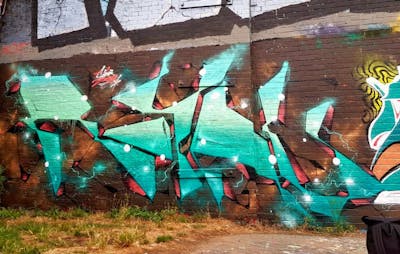 Cyan and Coralle Stylewriting by SIDOK and Royal Cru. This Graffiti is located in London, United Kingdom and was created in 2018.