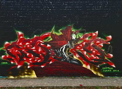 Red and Black Stylewriting by OBIS2, CUORE and WNA CREW. This Graffiti is located in Berlin, Germany and was created in 2022. This Graffiti can be described as Stylewriting, Characters and Wall of Fame.
