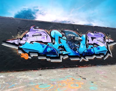 Cyan and Grey and Violet Stylewriting by Chr15. This Graffiti is located in Leipzig, Germany and was created in 2023. This Graffiti can be described as Stylewriting, Characters and Wall of Fame.