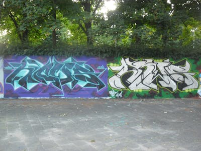 Light Blue and Chrome Stylewriting by News. This Graffiti is located in Tilburg, Netherlands and was created in 2014. This Graffiti can be described as Stylewriting and Wall of Fame.